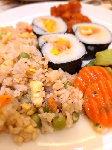 fried rice sushi sweet and sour pork