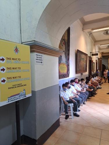 hallway with students to Sto Nino Chapel