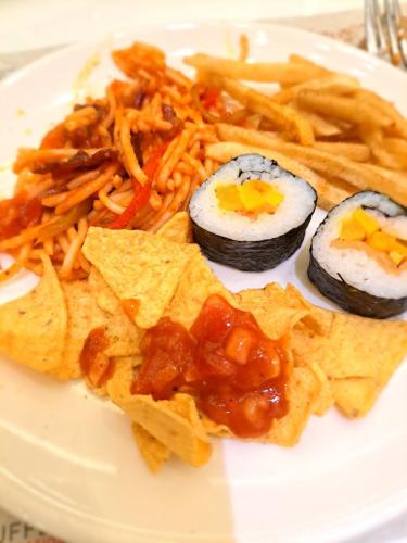 tacos sushi french fries and spaghetti